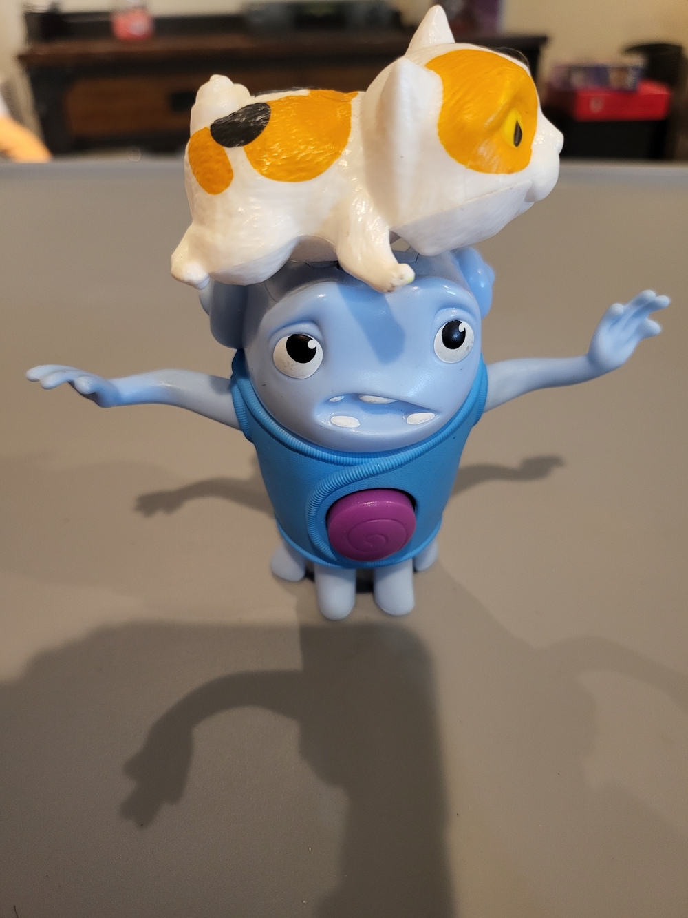 Dreamworks Light Blue Monster Figure with Orange-and-White Cat Stack
